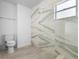 Stylish bathroom features a modern glass-enclosed shower at 1804 Westminster Trl, Clermont, FL 34714
