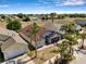 Aerial view showcases the home's front, roof and placement in the neighborhood at 1804 Westminster Trl, Clermont, FL 34714
