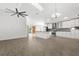 Spacious kitchen with an island, stainless steel appliances, and stylish white cabinetry at 1804 Westminster Trl, Clermont, FL 34714