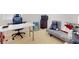 Small office space with desk, chair, and small sofa at 1850 Patriot Way, Saint Cloud, FL 34769