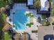 Community pool with surrounding patio at 1850 Patriot Way, Saint Cloud, FL 34769
