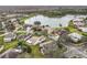 Community overview with lake view at 243 New River Dr, Kissimmee, FL 34759