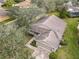 Single-Gathering home with gray roof, brick driveway at 243 New River Dr, Kissimmee, FL 34759