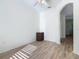 Bright bedroom with wood-look floors and ample closet space at 243 New River Dr, Kissimmee, FL 34759