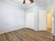Light and airy bedroom with wood-look floors and double closet at 243 New River Dr, Kissimmee, FL 34759