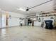 Garage with storage shelving and extra space at 243 New River Dr, Kissimmee, FL 34759