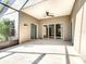 Covered patio with access to interior at 243 New River Dr, Kissimmee, FL 34759