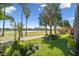 Beautiful backyard with a view of a golf course and pond at 2448 Palm Tree Dr, Kissimmee, FL 34759