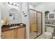Clean bathroom with single sink vanity and walk-in shower at 2448 Palm Tree Dr, Kissimmee, FL 34759
