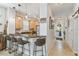 Kitchen with a breakfast bar and view into the hallway at 2448 Palm Tree Dr, Kissimmee, FL 34759