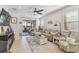 Gathering-friendly living room with patio access and natural light at 2448 Palm Tree Dr, Kissimmee, FL 34759