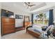 Serene Primary bedroom with ample light and water views at 2448 Palm Tree Dr, Kissimmee, FL 34759