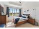 Spacious Primary bedroom with large window and water views at 2448 Palm Tree Dr, Kissimmee, FL 34759