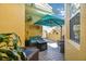 Cozy patio area with wicker furniture and fire pit at 2448 Palm Tree Dr, Kissimmee, FL 34759