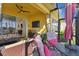 Relaxing outdoor patio with seating area and a view of the house at 2448 Palm Tree Dr, Kissimmee, FL 34759