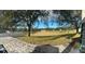 Large backyard with grassy area and patio at 2684 Clearview St, Clermont, FL 34711