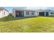 Large backyard with grassy area and home at 2756 Greenlands St, St Cloud, FL 34772