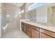 Bathroom boasts double vanity and walk-in shower at 2756 Greenlands St, St Cloud, FL 34772