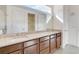 Double vanity bathroom with granite countertop and separate shower at 2756 Greenlands St, St Cloud, FL 34772