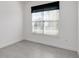 Bright bedroom with tile flooring and large closet at 2756 Greenlands St, St Cloud, FL 34772