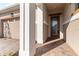 Covered entry with brick flooring and a modern front door at 2756 Greenlands St, St Cloud, FL 34772