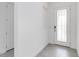 Bright entryway with tile floor and neutral colors at 2756 Greenlands St, St Cloud, FL 34772