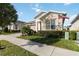One-story home with American flag and well-manicured lawn at 2756 Greenlands St, St Cloud, FL 34772