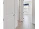 Bright hallway with tile floors and access to rooms at 2756 Greenlands St, St Cloud, FL 34772