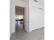 Hallway with tile flooring, access to dining room and bedroom at 2756 Greenlands St, St Cloud, FL 34772