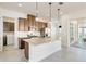 Modern kitchen with stainless steel appliances and granite countertops at 2756 Greenlands St, St Cloud, FL 34772