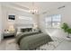 Main bedroom with plush bed and stylish decor at 2756 Greenlands St, St Cloud, FL 34772