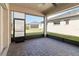 Covered patio with pavers and ceiling fan at 2756 Greenlands St, St Cloud, FL 34772
