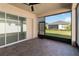 Spacious screened patio with brick pavers and backyard view at 2756 Greenlands St, St Cloud, FL 34772