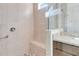 Walk-in shower with tiled walls and seat at 2756 Greenlands St, St Cloud, FL 34772