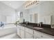 Elegant bathroom featuring double vanity and soaking tub at 2835 Crane Trace Cir, Orlando, FL 32837