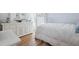 Bright bedroom with white furniture and wood floors at 2835 Crane Trace Cir, Orlando, FL 32837