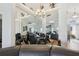 Elegant dining area with glass table and black chairs at 2835 Crane Trace Cir, Orlando, FL 32837