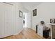 Bright hallway with wood floors and access to other rooms at 2835 Crane Trace Cir, Orlando, FL 32837