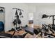 Home gym with various weight training equipment at 2835 Crane Trace Cir, Orlando, FL 32837