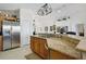 Kitchen island with granite countertop and double sink at 2835 Crane Trace Cir, Orlando, FL 32837