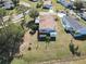 Aerial view of single-story house with backyard and shed at 301 Evandee Ct, Kissimmee, FL 34758