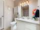 Clean bathroom with updated vanity, shower, and decorative accents at 301 Evandee Ct, Kissimmee, FL 34758