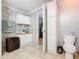 Clean bathroom with toilet, linen storage, and a vanity at 301 Evandee Ct, Kissimmee, FL 34758