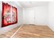 Spacious bedroom with wood-look floors and a large window at 301 Evandee Ct, Kissimmee, FL 34758