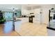 Kitchen with white cabinets, black appliances, and granite countertops at 301 Evandee Ct, Kissimmee, FL 34758