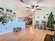Living room with hardwood floors, Christmas tree, and rocking chairs at 301 Evandee Ct, Kissimmee, FL 34758