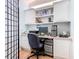 Home office with built-in cabinetry, desk, and computer at 301 Evandee Ct, Kissimmee, FL 34758