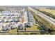 Aerial view of house and surrounding neighborhood at 3573 Bristol Cove Ln, St Cloud, FL 34772