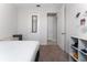 Bright bedroom with a double bed and built-in shelving at 3573 Bristol Cove Ln, St Cloud, FL 34772