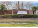 Deer Creek community entrance with brick signage at 3573 Bristol Cove Ln, St Cloud, FL 34772